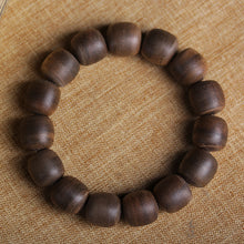 Load image into Gallery viewer, Wild Agarwood Bracelet from Cambodia 99% sinking grade Kynam 12mm Beads
